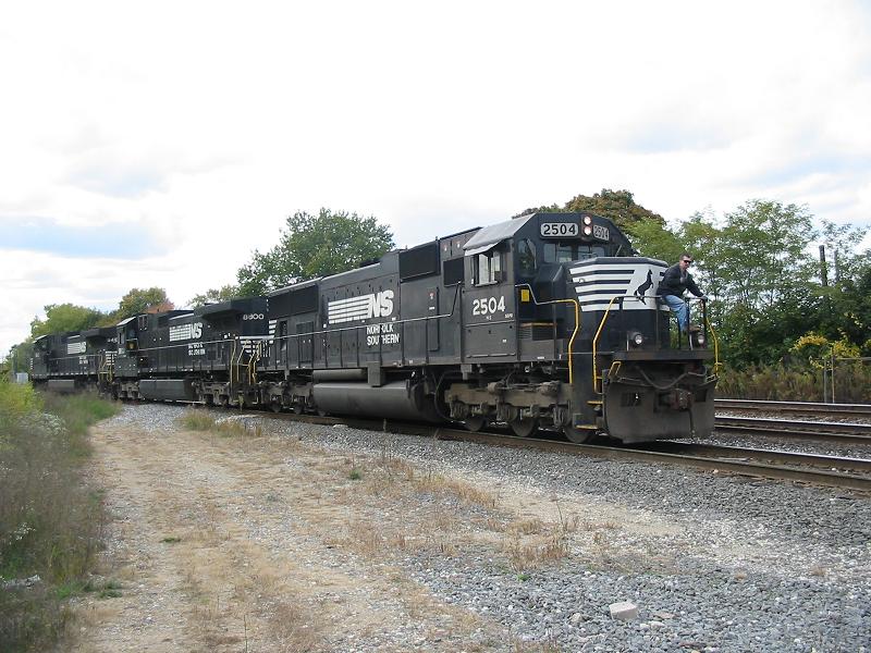 NS 2504
Lite engines head back to Elkhart... NS 2504 and it's conductor do the honors.  10/17/03
