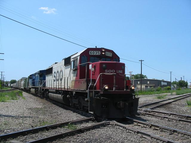 Sooline 6035
SOO #6035 headed east past the Durand Depot @ 1:48pm on 06/21/03 
