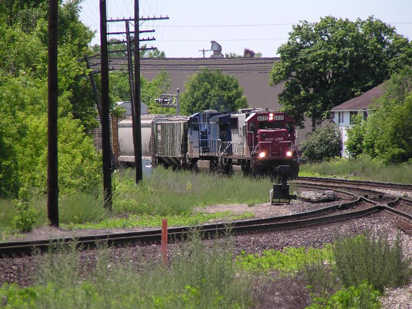 Sooline 6035
SOO #6035 headed east past the Durand Depot @ 1:48pm on 06/21/03. Photo courtsey of Variance.
