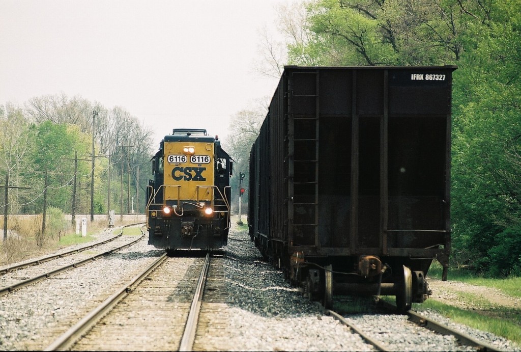 CSX GP40-2 #6116
Former Chessie GP40-2 #6116 has a clear indication on the main at AnnPere Junction, near Howell, MI.  This is the power for local job D708.  They have parked their 22 car train on the main track behind the camera and will take this opportunity to run-around their consist in Howell siding.  From the west end, they will switch out and complete their GLC interchange, on the transfer track at right.  May 13, 2011.
Keywords: GP40-2 6116 CSX Annpere Howell D708 local GLC interchange transfer coke hopper mast signal GRS