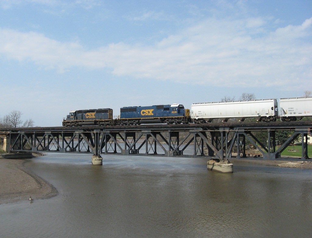 Q335 on the Thornapple River viaduct near Grand Rapids
By pure dumb chance, I caught April 10's Q335 as it reached the viaduct over the Thornapple River, viewed from the 48th Street bridge. This was the first time I'd ever been to that site, and it wasn't even a railfanning outing--I was just on my way back to Lansing from an errand in Grand Rapids. And the sun was out. Go figure. 
Keywords: viaduct bridge CSX