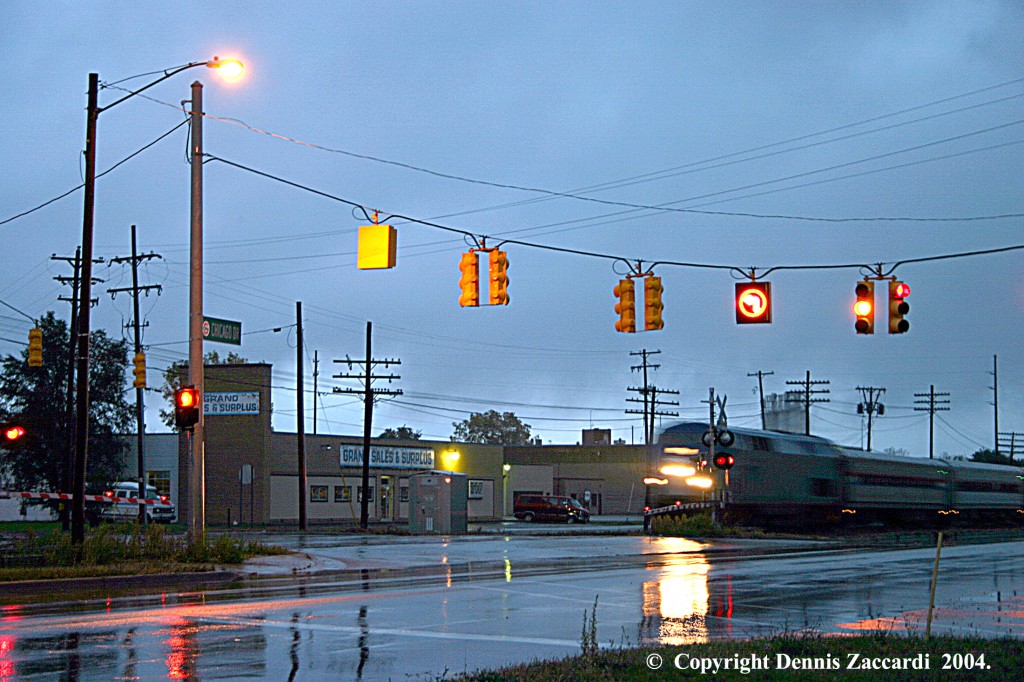 AMTRAK leaves for Chicago
The next morning, I got up early and (before I left for work) I headed to Ivanrest Road and Chicago Drive to catch AMTRAK P371 Jenny #192 leaving for Chicago, at 7:40 AM October 14, 2004.
Keywords: Grand Rapids, Michigan, AMTRAK Station, Ivanrest Rd.