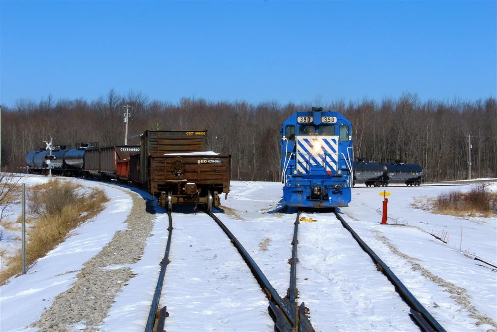 GLC 4 March 2016
390-396 at McBain Michigan switching out empty cars for loaded cars of used railroad ties for the electric generating plant owned by Viking Energy.
