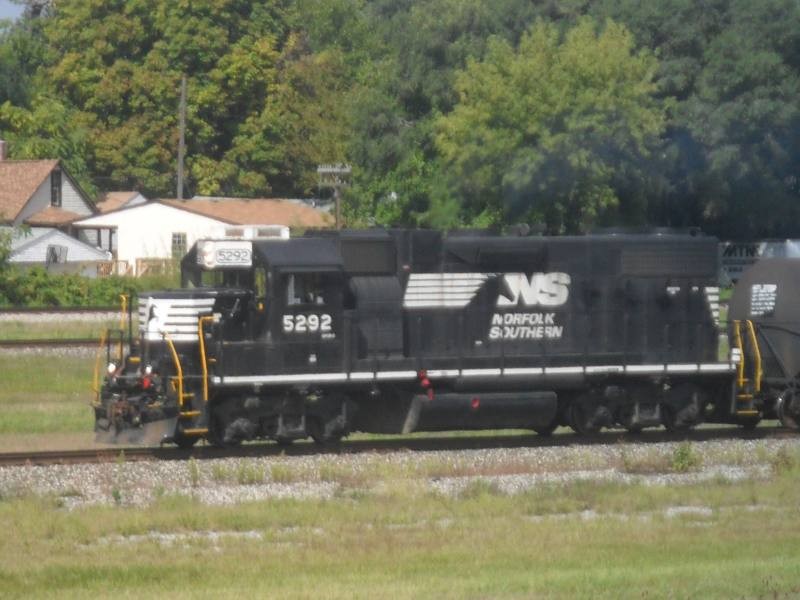 NS #5292 at Oak Street 9/23/2013
This GP38-2 is the lone leader of a short southbound Trenton 3 local job running wrong-main just south of Oak Street in Wyandotte on September 23, 2013, shortly after 12:30 PM. #5292 was originally built in February 1973 as Penn Central #8096, then became Conrail #8096. During the 1999 breakup, ownership of #8096 went to Norfolk Southern and renumbered #5292. It was then repainted into the horsehead livery around late 2011.
Keywords: NS Conrail PC 5292 GP38-2 Wyandotte